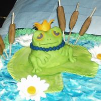 Close Up Of Frog this frogs was made of all fondant and the cat tails were fondant on skewers.