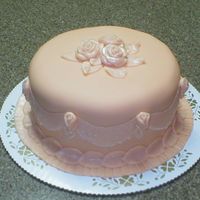 Orange-Colored Mango Cake Fondant over mango cake