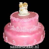 Lovely Pink Hello,i've made this pink wedding cake.Two layers and a special wedding cake topper on top.It's shiny because i rubbed it in with...