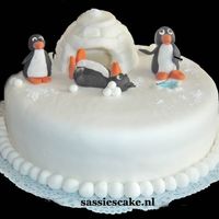 Artic Cake Hello,i made this funny cake with pinguins.All is made of sugarpaste and the cake is filled with a nice chocolate flavoured filling.The...