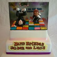 Breakdancing Dancefloor Cake This cake was a challenge, I made the two breakdancer toppers ages ago and both topper had a cake dowel through them sticking out, one...