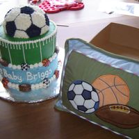 Sports Theme Shower Cake The topper is made using the wilton sports ball pan.