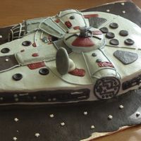 Millineum Falcon 3-D This is one of my favorite cakes ever. It is done in buttercream with some fondant accents.