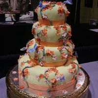 001.jpg I made this for a bridal show in January. I was due with my 3rd child 3 days after the show. Everyone though I was crazy.I love cake!! LOL...