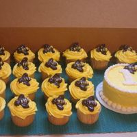 Cupcakes And Smash Cake These are the cupcakes and smash cake that went with the Pooh's Honey Pot cake. Same chocolate bees on top.