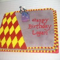 Harry Potter Vanilla cake with BC icing. The gray portion is Wilton ColorMIst.