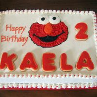 Elmo Thanks to Candy120 for the inspiration for this one! Vanilla cake, BC icing. Cookies are covered in rolled BC.
