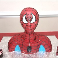 Spiderman A special thanks to all of the cake central members that give step by step instrutions... Spiderman was made with a styrofoam wig head and...