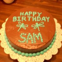 Birthday Cake I made this cake for my nephews 9th birthday. It was a white cake with chocolate icing, and the writing and border are done in BC.