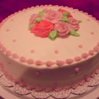 Wilton Course 1 Final My final exam cake!! Oh man my roses were terrible! One of my class mates was nice enough to make a couple for me (the dark pink), and my...