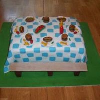 Summer Picnic My first experience with fondant. It was so much fun, I could of kept going. Underneath is a carrot cake frosted with regular buttercream....