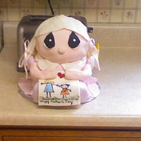 Precious Moments Doll First Try. Cake started to sink though. At least I know better for next time.