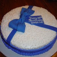 Blue Bow This cake was for a friend's sister. I made the textured bow and ribbon to add a little more interest to the cake.