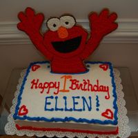 Elmo This is one of the 2 birthday cakes I did for my daughters first birthday. Elmo is an overbaked sugar cookie!