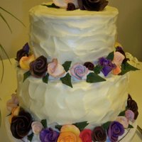 Toni's Birthday Cake Lemon Coconut Cake with Raspberry Filling and Lemon Cream Cheese Icing; fondant roses