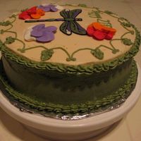 Dragonfly Cake Side View 21st birthday of friends daughter. Her daughter loves dragonflies. First attempt at colorflow after Wilton's course 2 class.