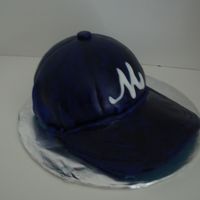 Baseball Cap Cake Attempt My 1st attempt at a baseball cap. Didn't think it was too bad for my 1st attempt And my 2nd cake.Special thanks to JulieBugg2000, she...