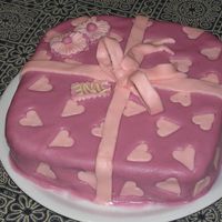 Parcel Present Cake for my sister in law; yellow sponge cake with strawberry filling and sugarpaste on top