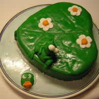 Frog On A Leaf In Water Cake frogs made in milk paste