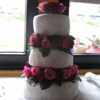 Red Rose Wedding Cake for my mom's birthdaymy FIRST WEDDING CAKE EVER! Sugarpaste is homemade - as allways and it crackled but it's my first so... i...