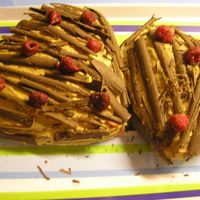 Two Hearts For My Boyfriend just my way of telling him...chocolate pound cake with expreso (coffe) buttercream and chocolate shavings and raspberries on top