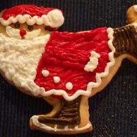 Skating Santa I saw this in a book..and had to try it! Buttercream icing and sugar cookie..Happy Icing!