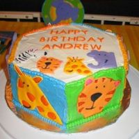 Safari 1St Birthday Cake This was the cake for my nephew's 1st bithday party. Each side of the cake features an animal made from royal icing. I took the paper...