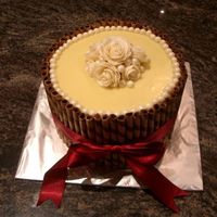 Roses & Pearls Birthday Cake This is my 2nd decorated cake. It was for my MIL's birthday. Chocolate Cake with a filling of whipped white cream ganache and...