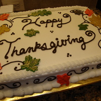Happy Thanksgiving Made this cake for my husband's office potluck. Buttercream with fondant leaves dusted in gold.