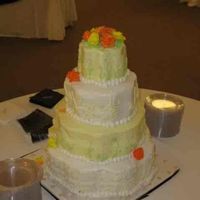 Petal Pan I hate this bleeping pan! It will be a looong time before I use that thing again!!!This was my little sis's wedding cake.buttercream...