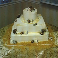 Sheila's Wedding Almond Ameretto cake and filling, Bottom layer Almond Ameretto cake w/ raspberry mousse filling. Mom of bride brought chocolate hazelnut...