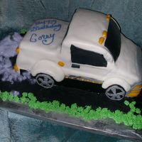1St Truck Cake Chocolate cake w/fudge &chocolate ganache filling. .The picture of a similer cake was given to me to copy. I learned a lot and will do...