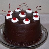 Chocolate Cherry Cake One sweet tooth later and you get this double layer chocolate ganash cherry cake!! And boy was it yummy! :-)