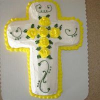 Easter Cross Yellow cake with buttercream icing. This was my first attempt at roses. The icing was a little soft so they are not as "firm" as...