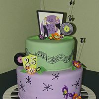 "swing Dance" Fondant covered cake with GP flowers and accents, and edible image topper. A lot of fun to do. Enjoy it!