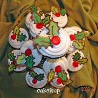 Christmas Cupcakes Chocolate cupcakes with ganache centers, covered in IM frosting and chocolate transfer leaves. The best tasting cupcakes I ever made!