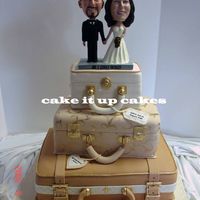 "bermuda Or Bust" Fondant covered cake with GP details. Topper was provide by the bride and groom. For a lovely couple who wanted to celebrate their love for...