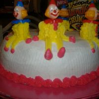 Clown Cake My 13 year old son made this cake.He has never made cakes this was his 1st time baking and decorating during his course 1 class with wilton...