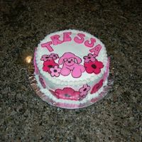 Pink Poodle Webkinz Cake A double layer cake with buttercream frosting. The poodles, flowers and names are all chocolate transfers.