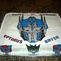 Transformers Cake Optimus Prime chocolate transfers birthday cake. This is the first time I had done the chocolate transfers but very happy with the outcome...