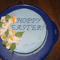 Hoppy Easter Easter cake with cala lilies and iced in buttercream