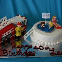 Fireman To The Rescue Made the firetruck from 9x 13 cake and other is a 10 in round cake. Struggled with design but happy with outcome. Figures made from fondant...