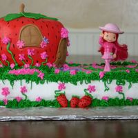 Strawberry Shortcake cake i did today for a friend's dtr. had someone else pick up, so hope the little girl likes it. strawberry is banana with chocolate...