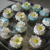 Wedding Cupcakes these cupcakes were for the same order with the blue arum lily cake i've just posted. Didnt manage to take a pic of the final set up...