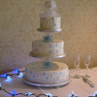 Snowflake Wedding 14 inch wasc with raspberry filling, 10 inch choc almond sc with mocha ganache filling, and 6 inch choc with rasp filling, all edible...