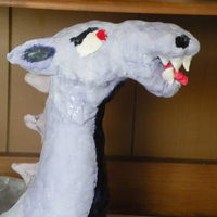 Dragons Head my first attempt of sculpting rice krispie traets. Made this for my sons 15th birthday, he asked for a purple dragon...