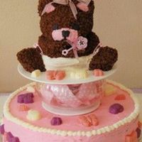B Is For Baby This is one of my first cakes done. It has bears, booties, bottles, butterflies, and bugs(lady).