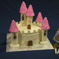 Castle Cake My daughter's 6th birthday cake. I got the idea from the 2hr cake book. The cake is fondant with a brick pattern rolled onto it. The...