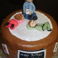 Daughter's Birthday Cake i had to transport this cake 4hrs on a train and it got good and shaken up:(the black board almost slid off the side and it suffered much...