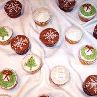 Cupcakes For Opening Night Celebration rolled buttercream. chocolate cupcakes with gold leaf. pumpkin chai with edible image logos.